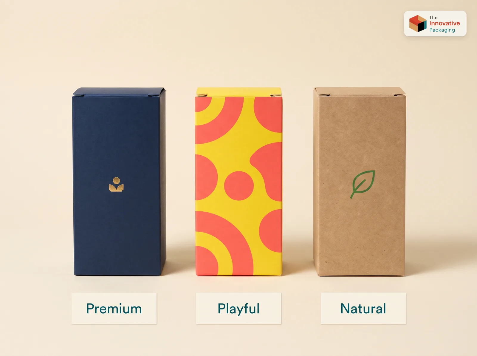 Packaging color psychology: three identical cartons in navy with a gold foil mark, bright yellow and coral, and natural kraft with a green leaf, labeled premium, playful and natural